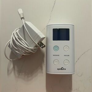 Spectra 9 with milk storage bags and some accessories